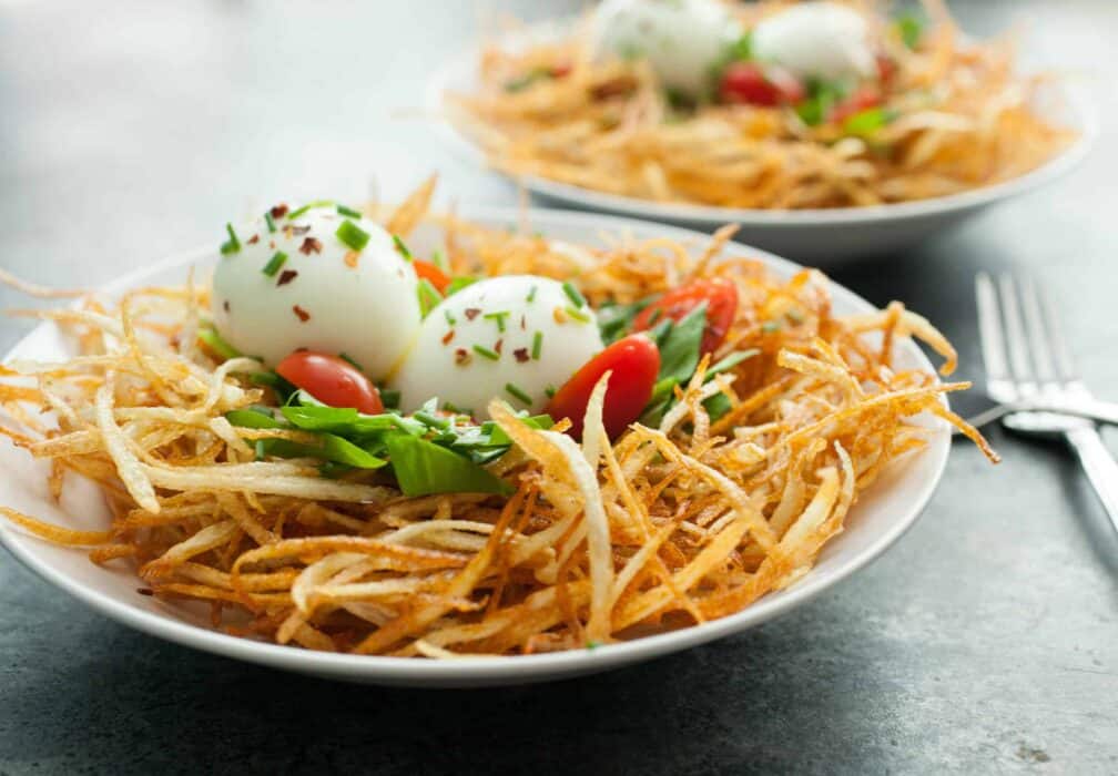 Bird's Nest BreakfastS: Thin fried slivers of potato layered with a few veggies and soft-boiled eggs. A fun and very delicious breakfast! | macheesmo.com