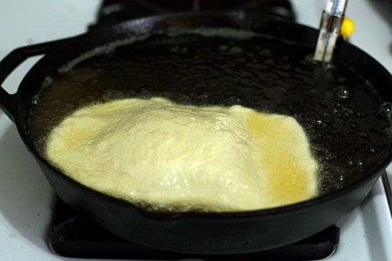 Frying chalupa dough in cast iron skillet. - Chalupas