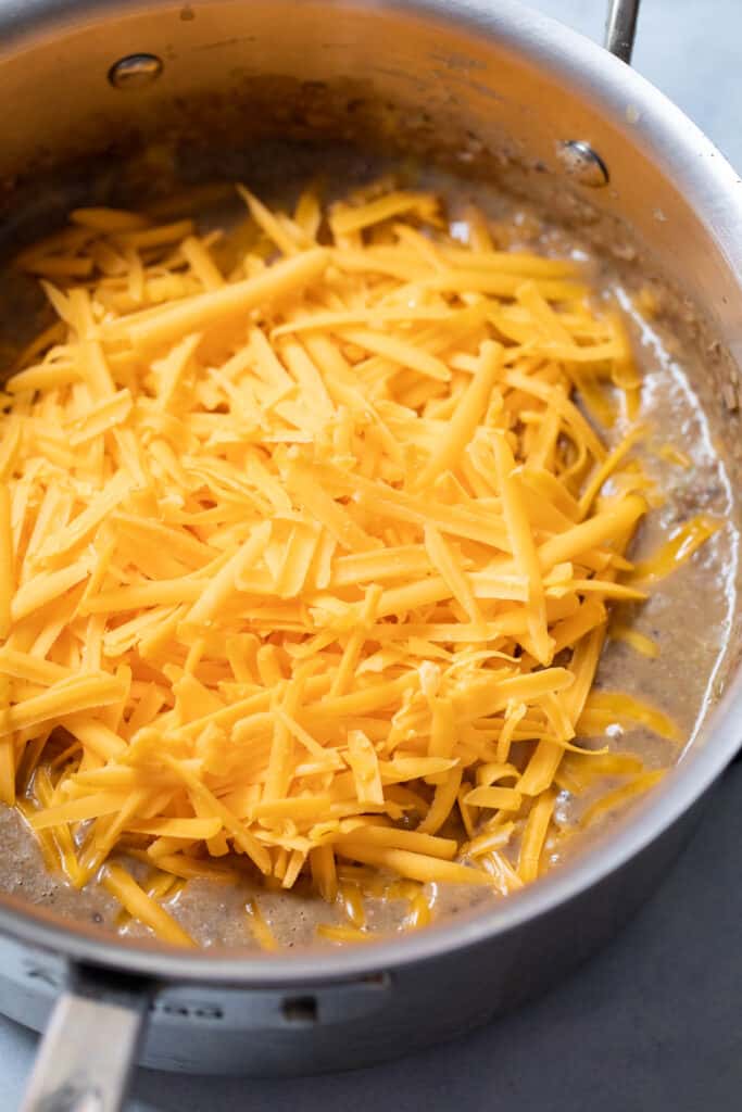 Cheese added to bean dip.