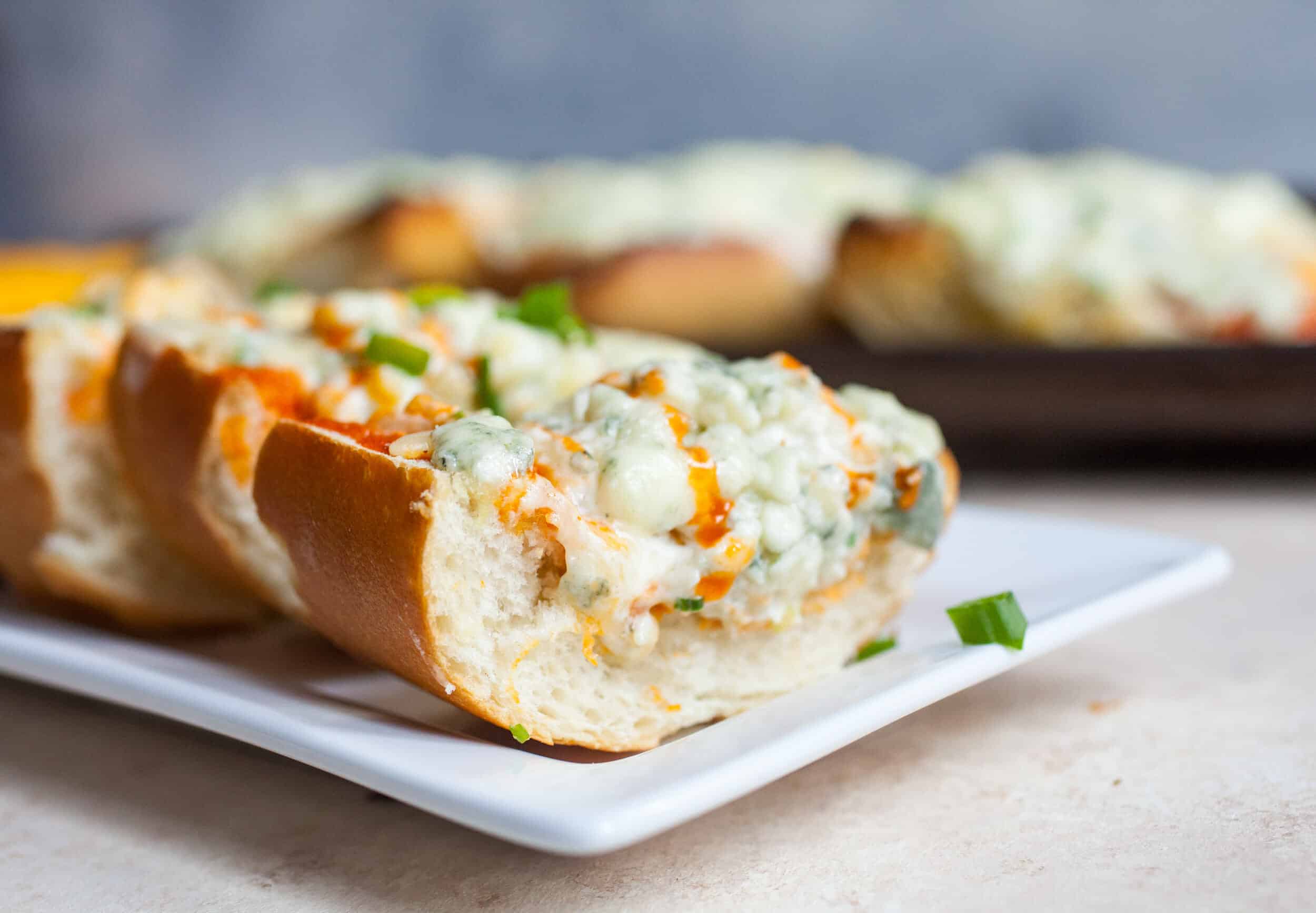 Buffalo Bread: This easy baked bread is a perfect hearty appetizer for game day. Dig in! | macheesmo.com