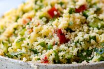 A simple tabbouleh recipe made with couscous and lots of fresh veggies and herbs. Light and fresh and perfect for a healthy lunch or a dinner side dish!