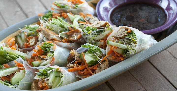 Marinated and seared tempeh sliced and stuffed in these Vegan Spring Rolls with a ton of fresh, bright vegetables. Delicious and healthy!