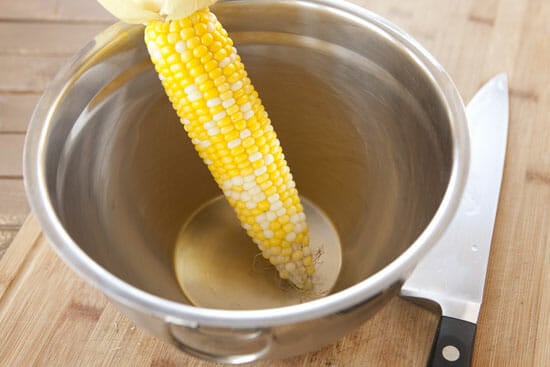 Shucked corn for Elote Dip.