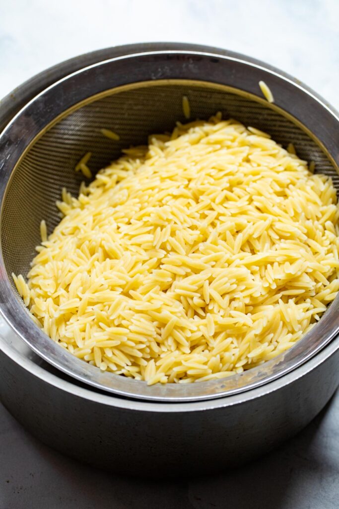 Orzo pasta cooked and drained