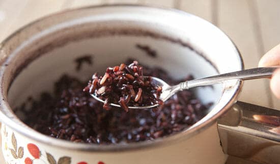 Cooked, tender wild rice.