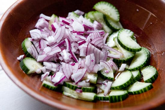 Cucumbers and onions - Greek Tomato Salad