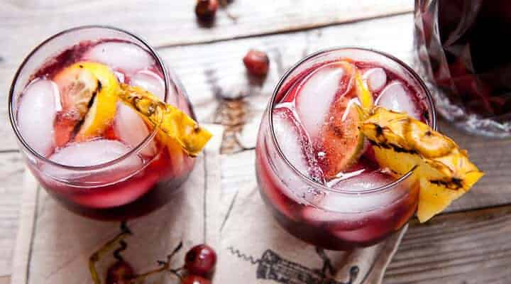Grilled Fruit Sangria: A great way to change up classic sangria is to grill all the fruit first! It releases the juices and deepens the flavors. Post includes my favorite wine to make sangria!