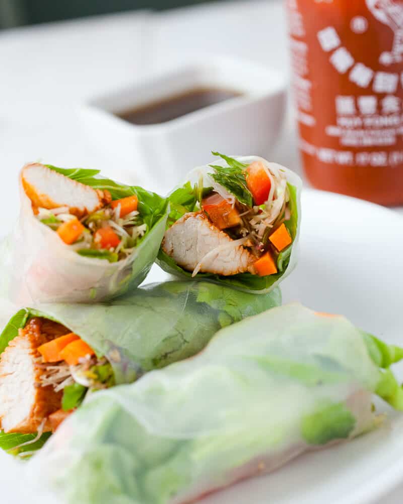 Sriracha Chicken Spring Rolls: A fresh and spicy spring roll that's substantial enough to make a meal out of, but also works great as an appetizer! 