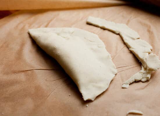 Making the stuffed masa for fried tacos.