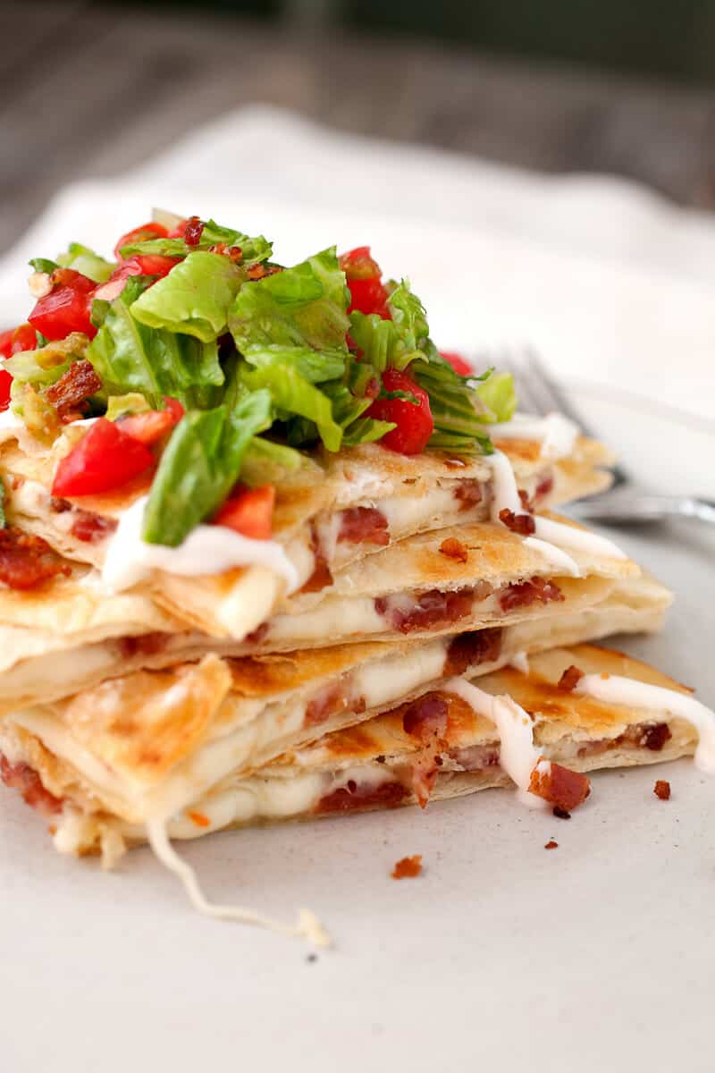 BLT Quesadillas: Simple quesadillas filled with crispy bacon and spicy pepper jack cheese and topped with a light and fresh tomato salad! | macheesmo.com