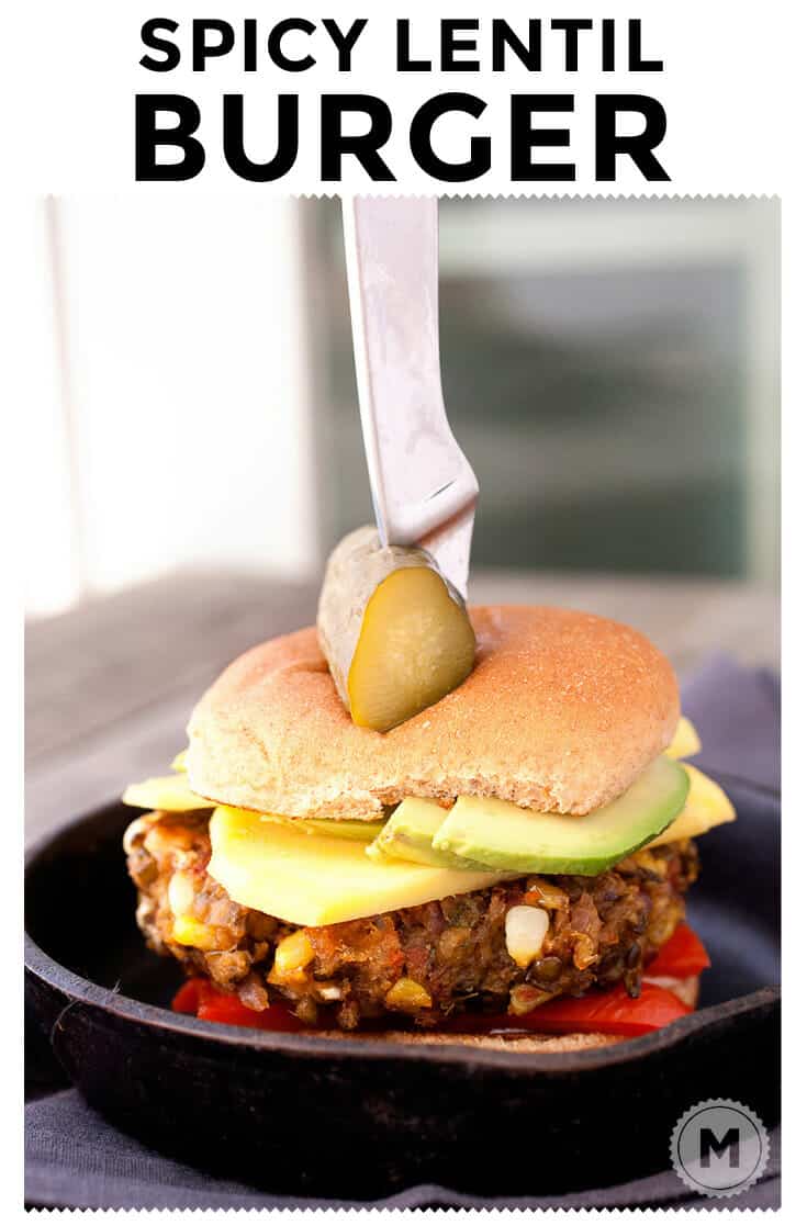 Spicy Lentil Burgers! Beautiful green lentils mashed with lots of spice, shaped into burgers, and cooked until crispy on the edges. Served with fresh mango, avocado, and roasted red peppers!