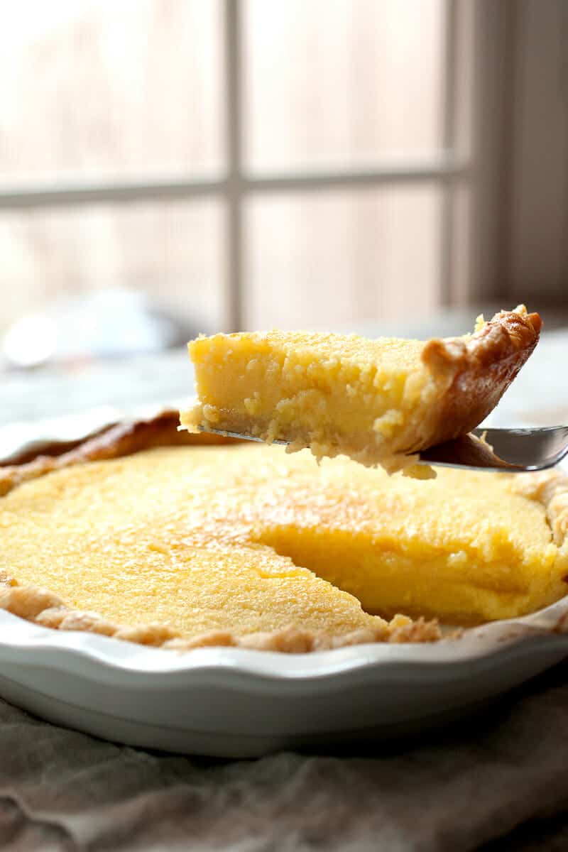 Old Fashioned Lemon Buttermilk Pie: This custard pie is such an unassuming pie. That's good news because it means people won't go for it first. But, once someone tries it, it'll go quick. Easy to make with just a few ingredients! | macheesmo.com