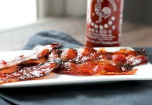 Sriracha Candied Bacon: This is a super-simple twist on bacon that will hit all the right tastebuds. Slightly sweet and spicy, this is bacon at its best! | macheesmo.com
