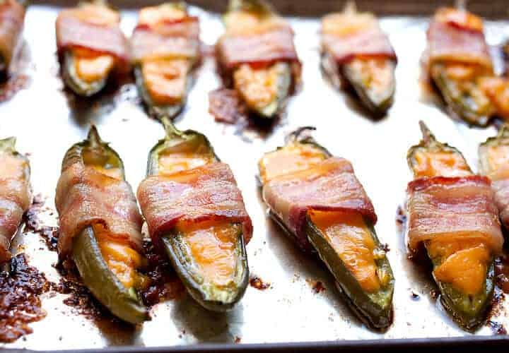 Three Ingredient Baked Jalapeño Poppers: These little guys are easy to make and SO addictive. Make a big batch of these for your next game day celebration and try not to eat them all yourself! | macheesmo.com