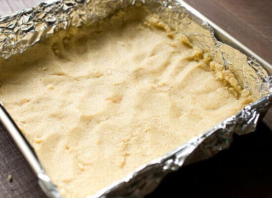 Par Baking the almond crust.