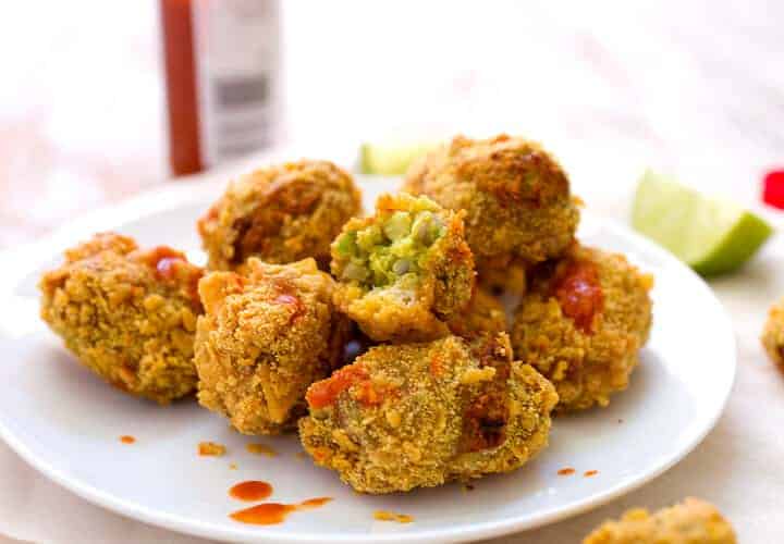 Guacamole Tots: Fried little bites of guacamole, queso fresco, and crumbled corn chips make for maybe the best Tex-Mex appetizer out there. Totally worth the work and very addictive! Warm guacamole is a very real thing! | macheesmo.com