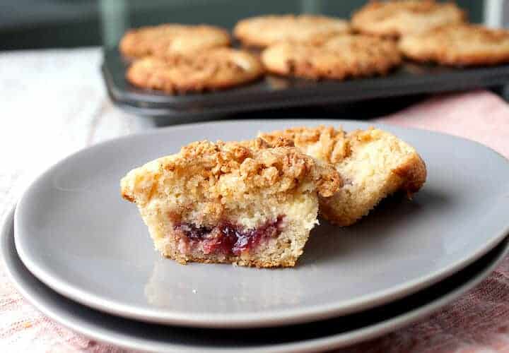 Cream Cheese and Jam Muffins: After many attempts, this is the way to stuff a muffin with just enough cream cheese and fruit jam. The finished muffin is sweet, tangy, and crunchy on top thanks to some granola streusel. A huge success! | macheesmo.com