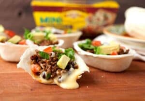 Molten Taco Boats: Mini taco boats with a hidden layer of homemade queso. Topped with any taco fillings you like. Such a fun appetizer! | macheesmo.com
