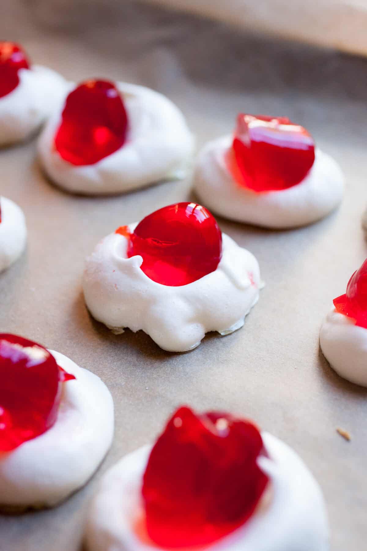 Meringue Jelly Shots: Fun orbs of jelly (with some optional booze) nestled in a completely edible meringue cup. Really fun and a perfect party treat! | macheesmo.com