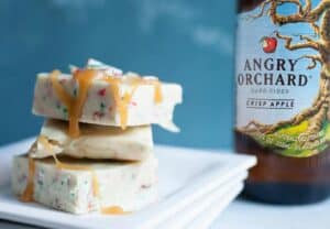 Hard Cider White Peppermint Fudge: This easy holiday fudge starts with reduced Angry Orchard Hard Cider. Plus, I like to top mine with a drizzle of Fireball Whisky caramel! YUM. | macheesmo.com