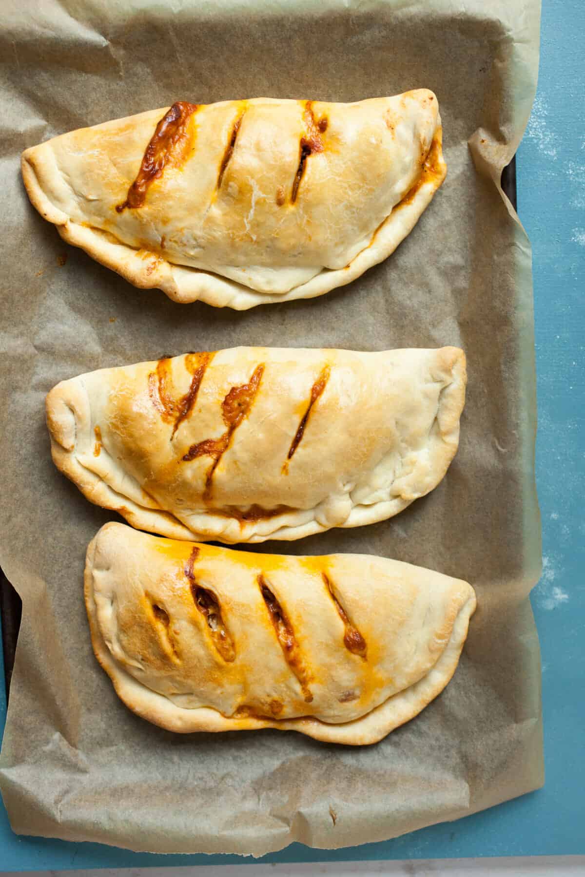 Sausage and Pepper Hot Pockets: These delicious homemade hot pockets are stuffed to the max with sausage, peppers, and cheese. They freeze perfectly as well and make for quick meals whenever you need one! | macheesmo.com