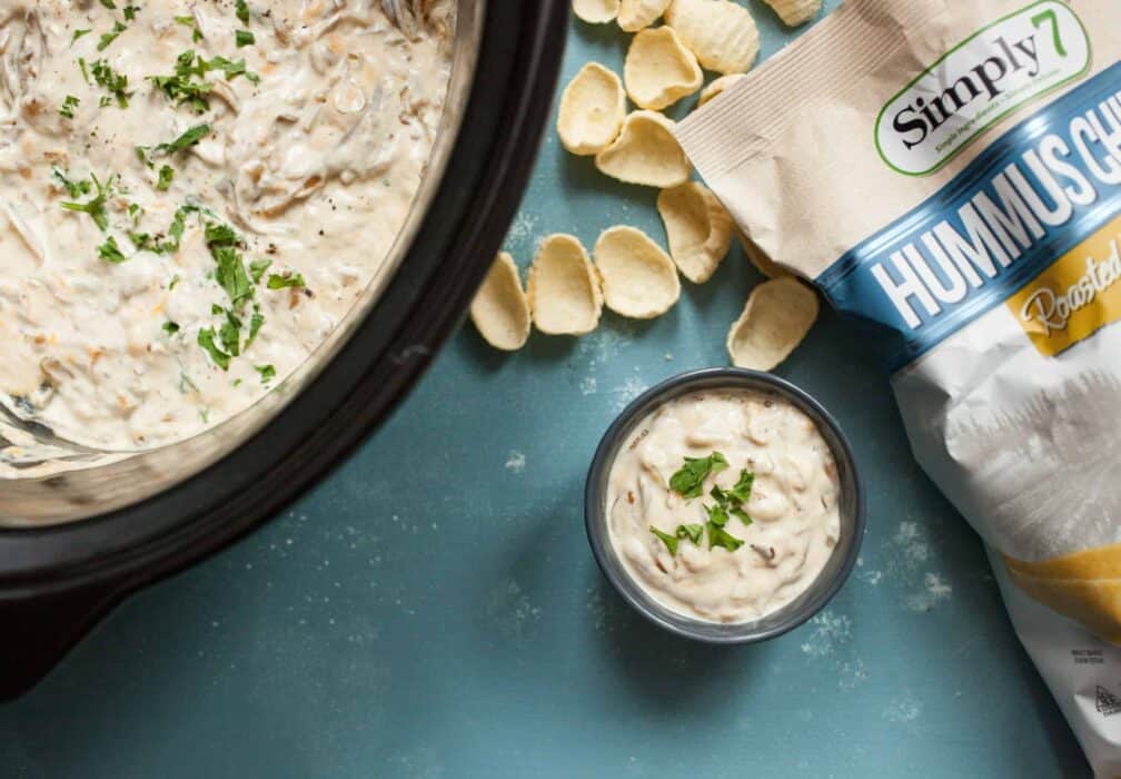 Slow Cooker Caramelized Onion Dip: This warm dip is loaded with flavor thanks to all-night-cooked caramelized onions! It uses mostly Greek yogurt to keep it relatively light and is perfect for a game day appetizer! | macheesmo.com