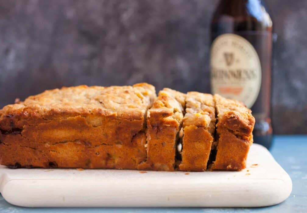 Guinness Banana Bread: At some point in your life you'll have bananas on the verge of spoiling and there's no better use than a good banana bread! This one uses Guinness and has white chocolate folded in! | macheesmo.com