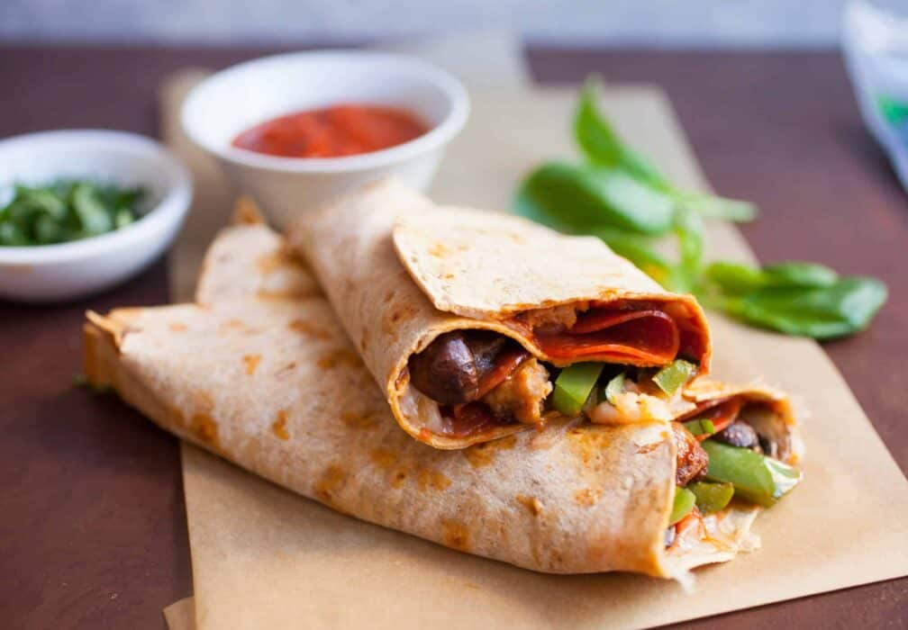Supreme Pizza Wraps: Everything you love in a Supreme pizza except toned down a bit for wrap size. Delicious flavors and hand held! | macheesmo.com