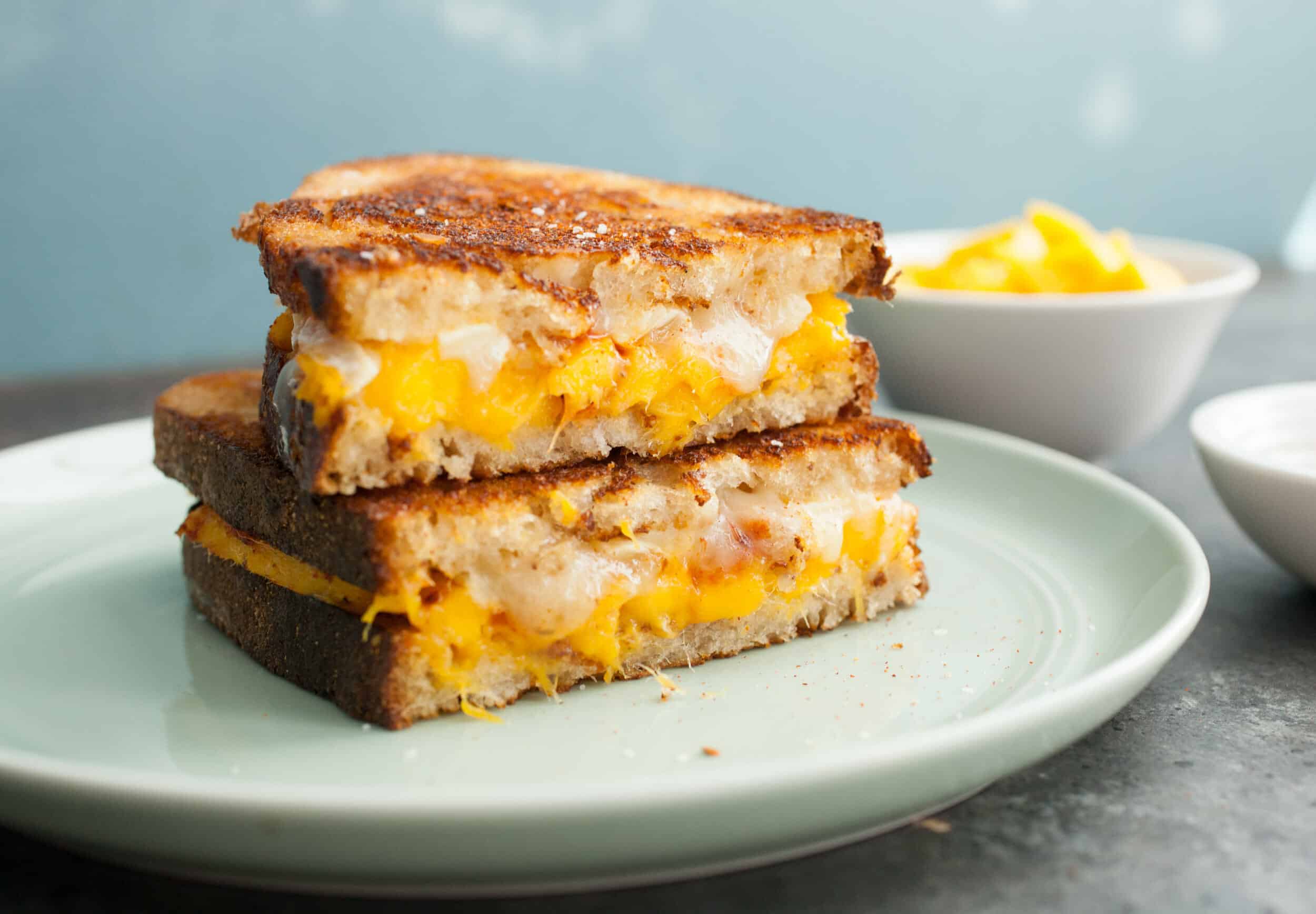 Chili Mango Brie Grilled Cheese: Chili and mango are made to be together and they perfectly with a creamy brie cheese in this grilled cheese sandwich. It's your new favorite thing. Trust me. | macheesmo.com