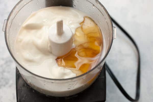 Blending honey and yogurt mixture.