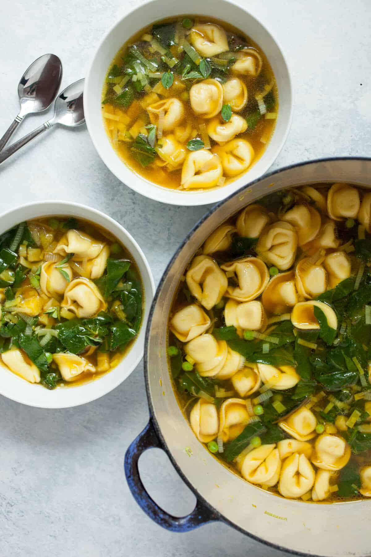 Spring Tortellini Soup: This is a really easy soup to toss together. It's filled with fresh spring veggies and tortellini. Ready in about 30 minutes! | macheesmo.com
