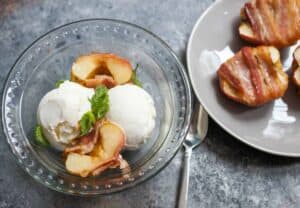 Bacon Wrapped Baked Apples: A slightly savory twist on dessert. Apples stuffed with brown sugar and spices and baked wrapped with bacon. HINT: Serve it with ice cream. YUP. | macheesmo.com