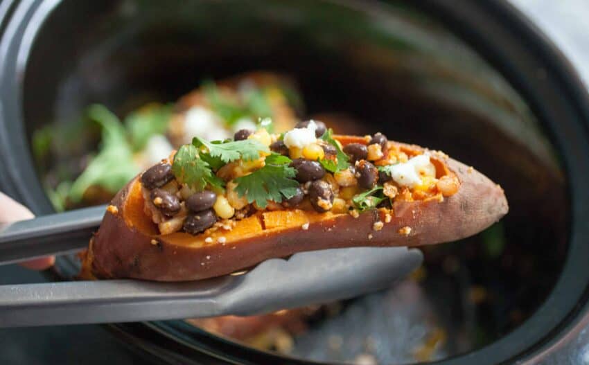 Stuffed Tex Mex Slow Cooker Sweet Potatoes: These sweet potatoes are the perfect mix of spicy, sweet, and savory and you can practically set them and forget them! A great vegetarian friendly meal! | macheesmo.com