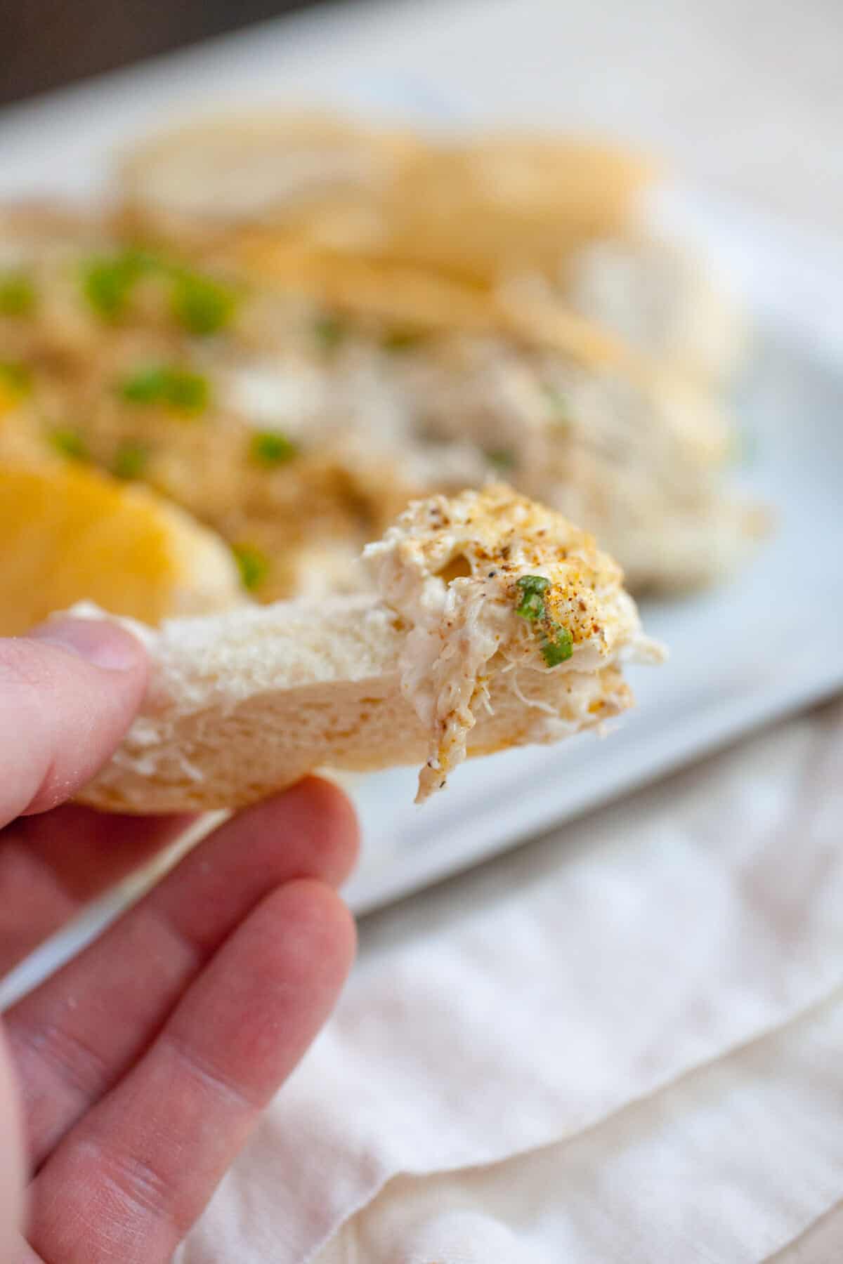 Crab Dip Stuffed French Bread: Easy crab dip stuffed and baked into a French loaf. A great party appetizer! Perfect for New Years! | macheesmo.com