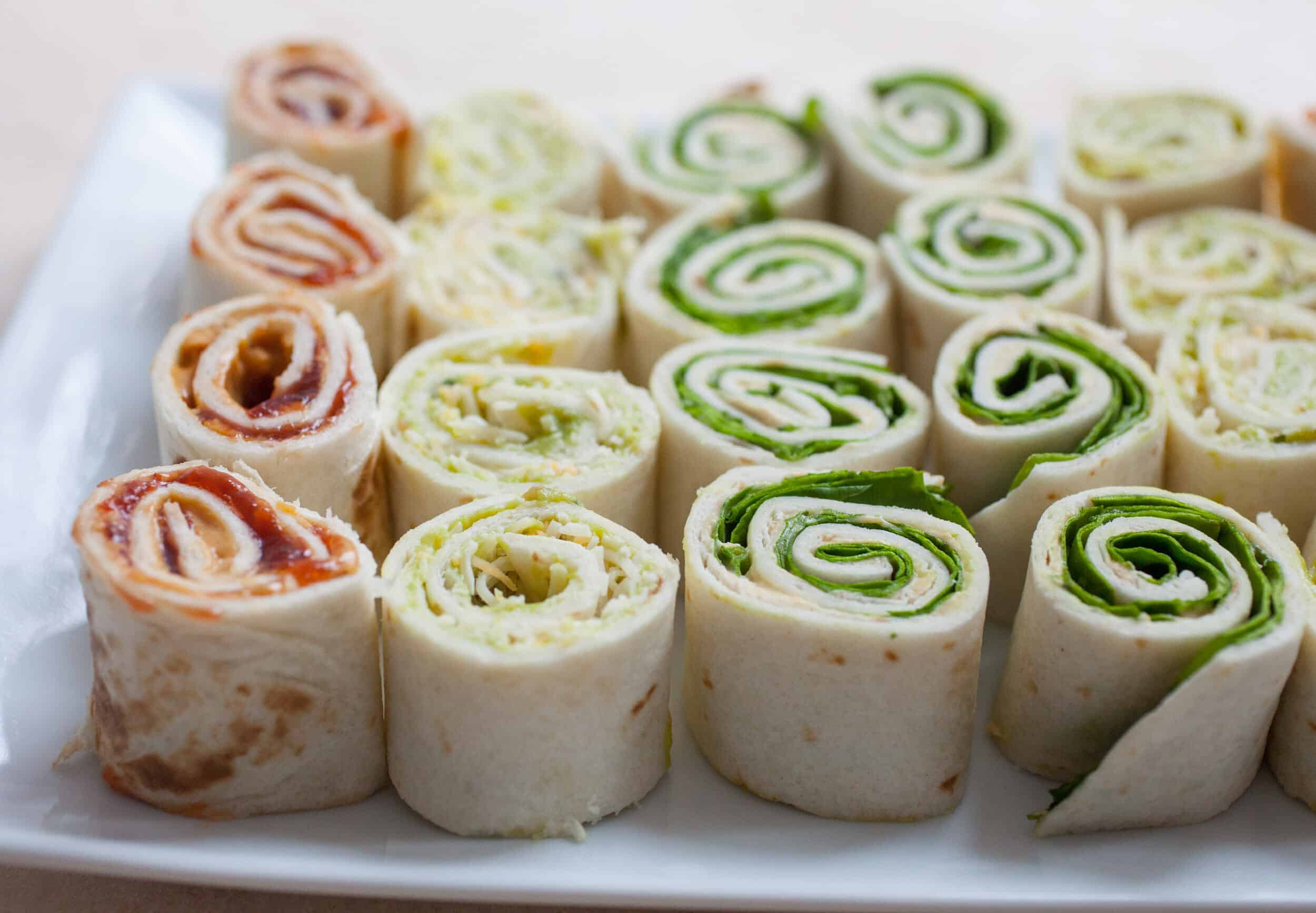 Three Easy Pinwheels: Getting snacks ready for hungry kids can always be a bit of a obstacle course. I like to keep these quick pinwheels at the ready for easy snacks! | macheesmo.com