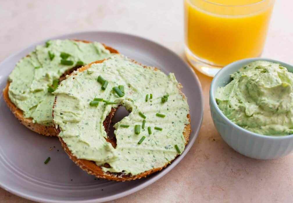 Lucky Green Cream Cheese: This lightened-up cream cheese spread is packed with herbs and ripe avocado. It makes for the perfect schmear and is a great St. Patty's Day breakfast! | macheesmo.com