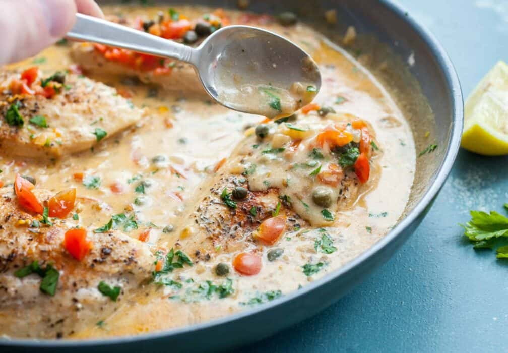 Easy Lemon Skillet Chicken: This 30 minute skillet dish is a fantastic and easy change up from your normal weekday meal. Serve it over pasta and rice! | macheesmo.com