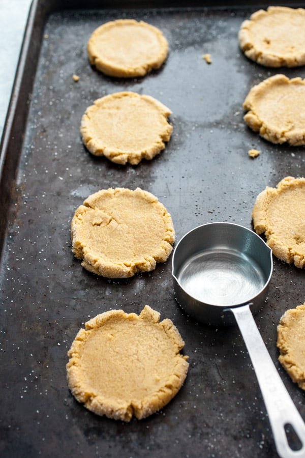 Pumpkin Pie Sugar Cookies baking on a sheet pan.