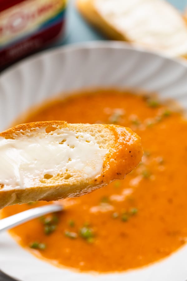 Bread dipped in buttery tomato soup.