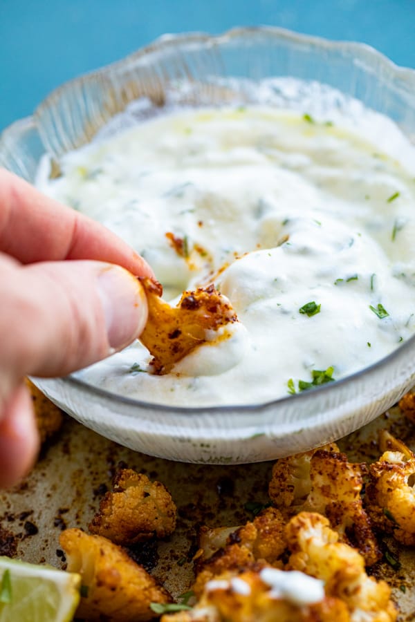 Spicy Roasted Cauliflower dipped in cilantro sauce.