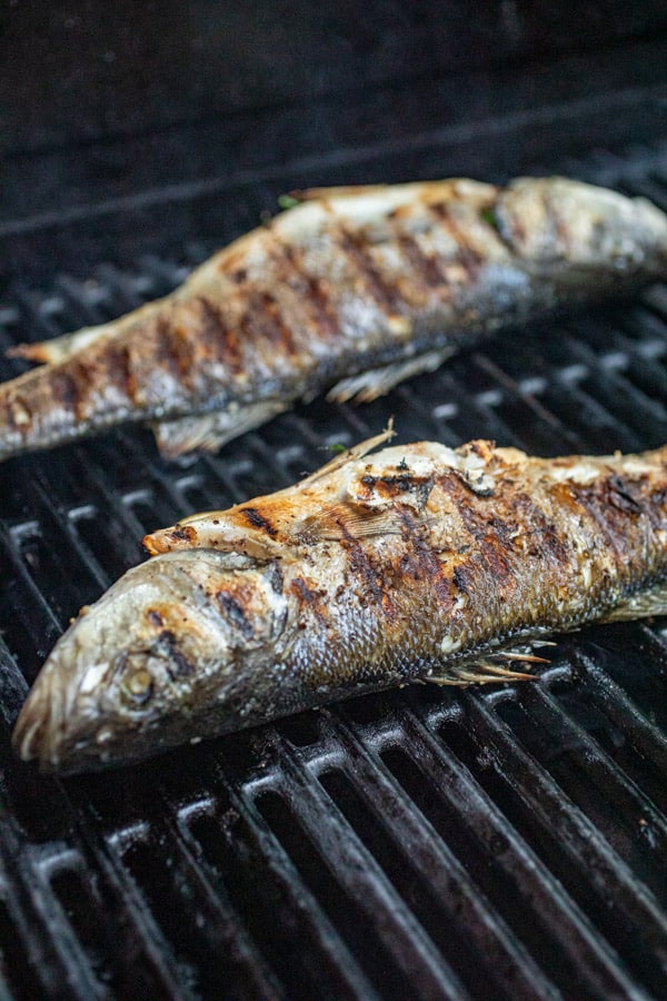 Flipped fish on grill.