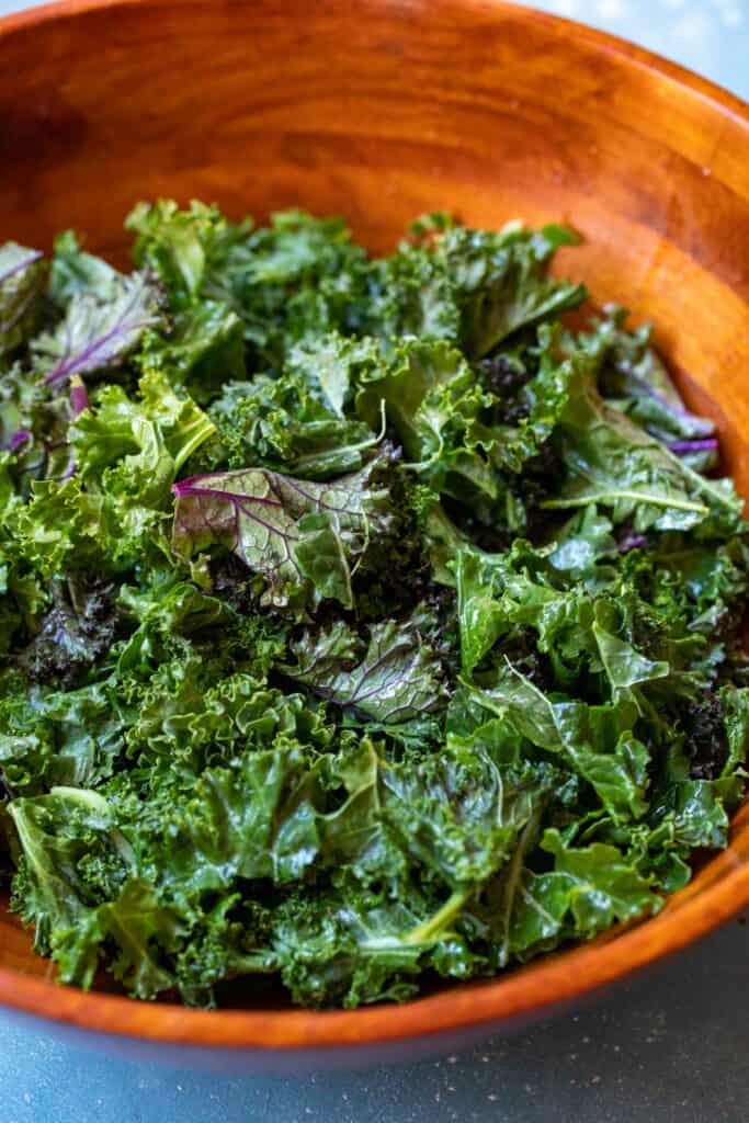 Massaging the kale for salad