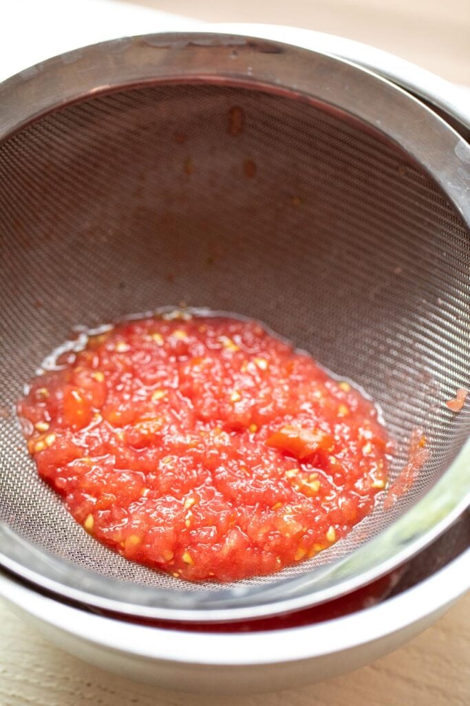 Strained tomato mixture for toasts.