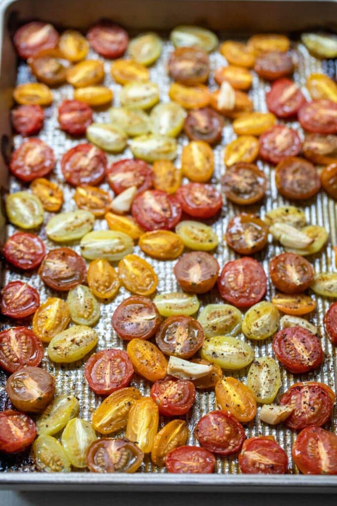 Roasted cherry tomatoes for pearl couscous salad.