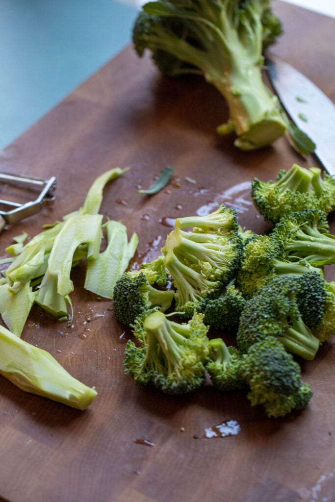 Chopping broccoli.