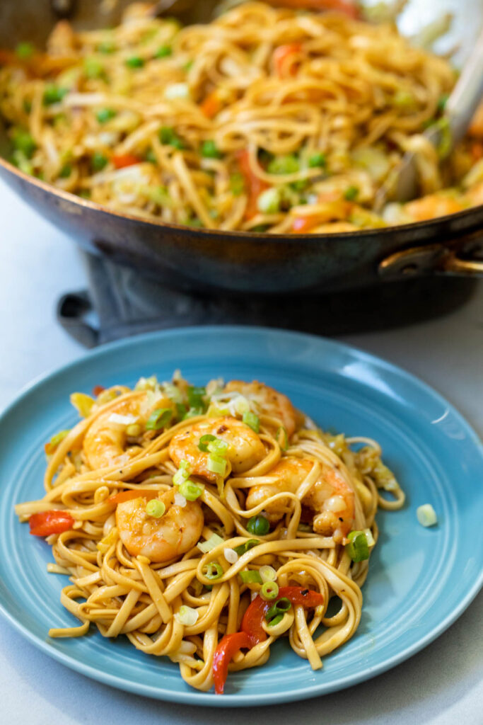 Shrimp lo mein on a plate.